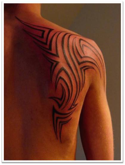 Man Embedding a Tribal Tattoo