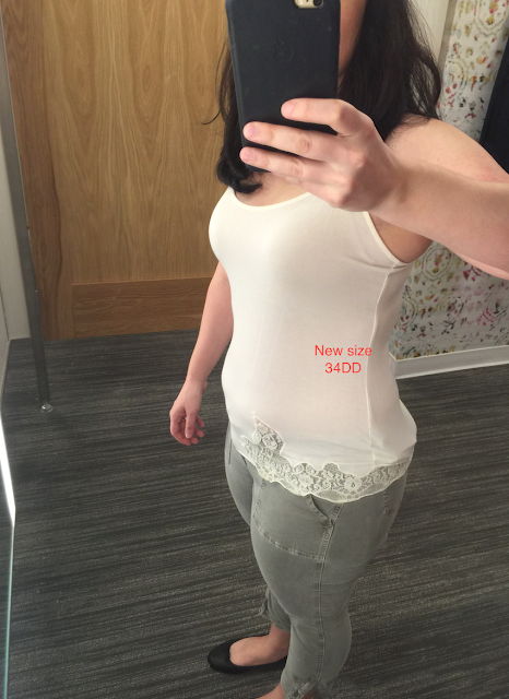 woman trying on a double d bra size