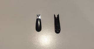 The nail clipper with the cover detached