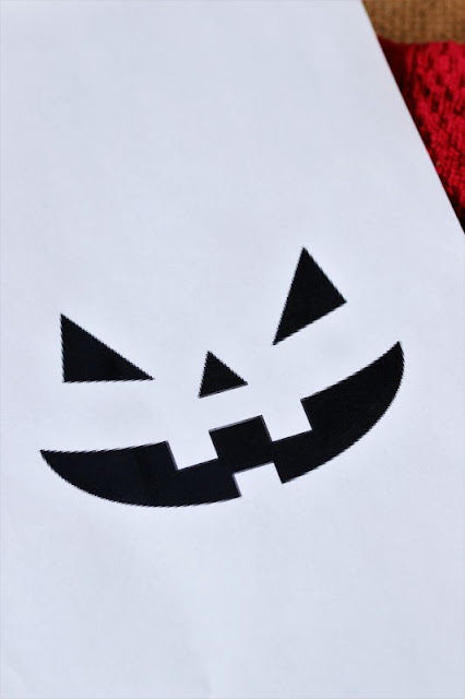 Printed Out Jack o Lantern Face to Make Halloween Mason Jar Drinks Image