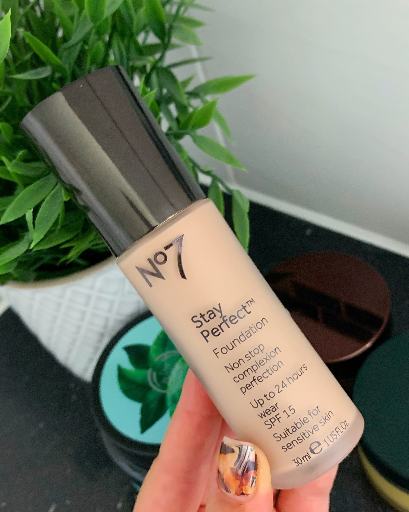 No7 Stay Perfect Foundation being held