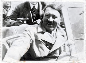 Adolf Hitler smiling worldwartwo.filminspector.com