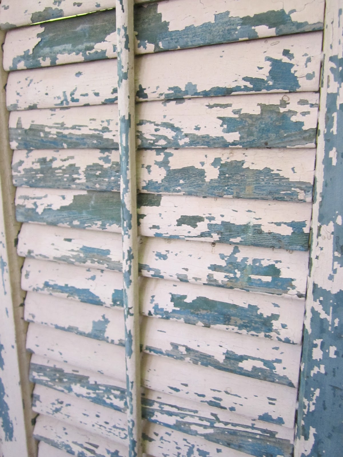 Pallet for Home Salvaged Shutters Turned Screen