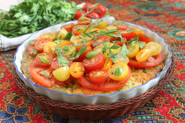 Food Lust People Love: This tomato salad topped baked spinach frittata is a delicious combination of richness from the eggs, ham and cheese and the sharp sweetness of the tomatoes with herbs. It makes a wonderful brunch, lunch or dinner dish!
