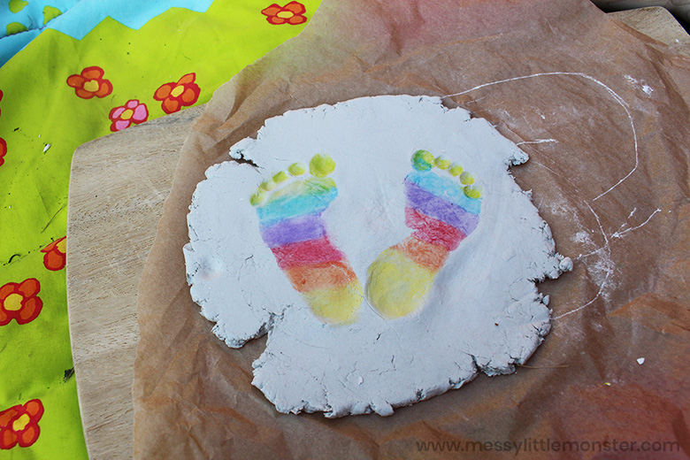 Clay Baby Footprint Art with rainbow footprints! Messy Little Monster