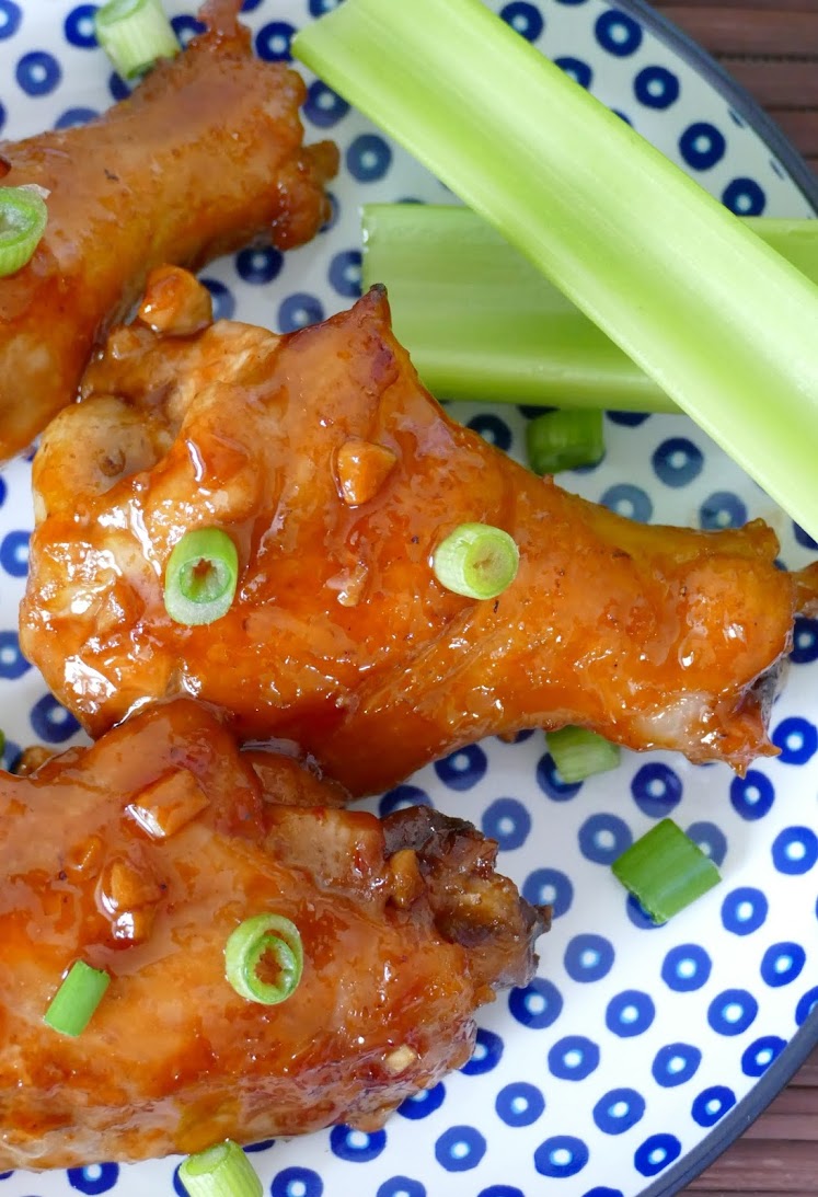 These easy, sticky oven baked wings are the perfect appetizer for any game day party, for dinner or any holiday. The teriyaki and garlic flavor is delicious and the Asian flavored sauce is super simple to make! They are a crowd pleaser! 