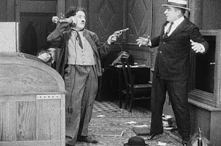 Кадр из фильма Чарли Чаплина The New Janitor (1914) - 13