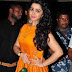 Charmi at TSR TV9 National Film Awards In Orange Dress
