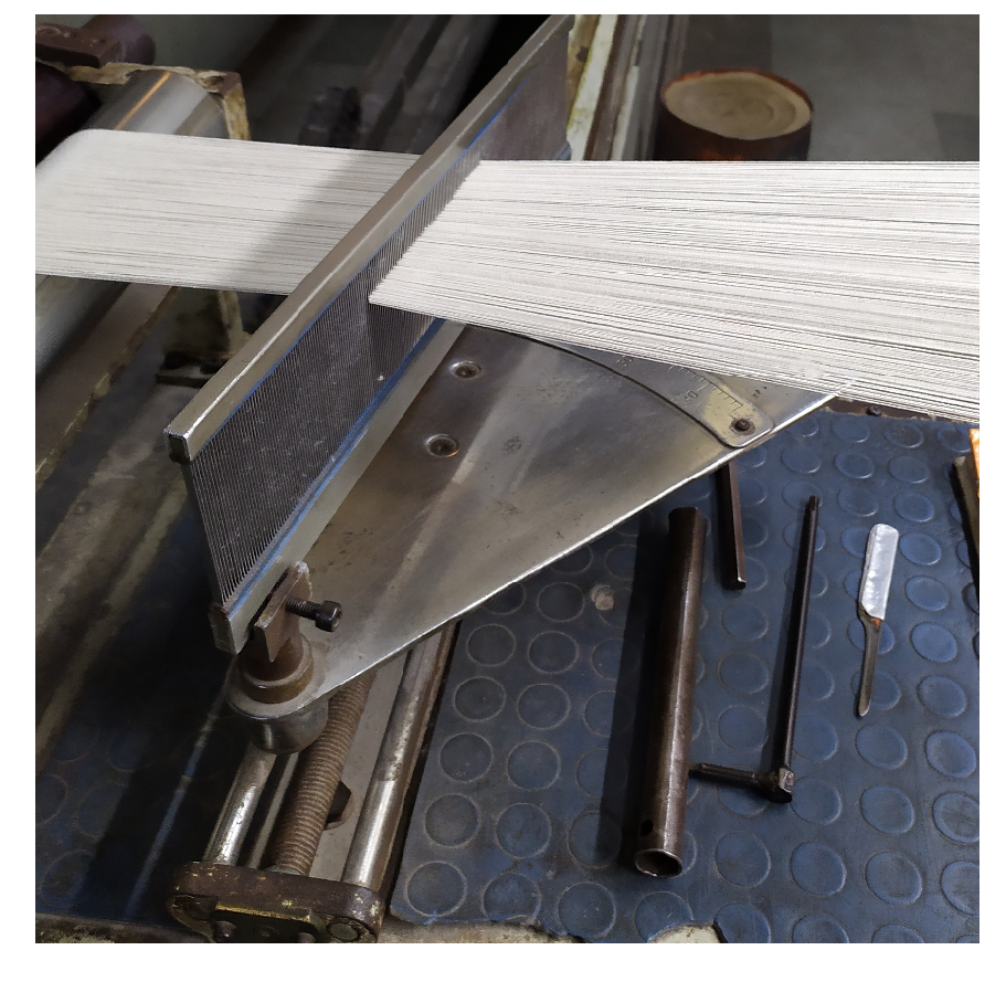 Textile Adviser SECTIONAL WARPING PROCESS l STRUCTURE AND WORKING