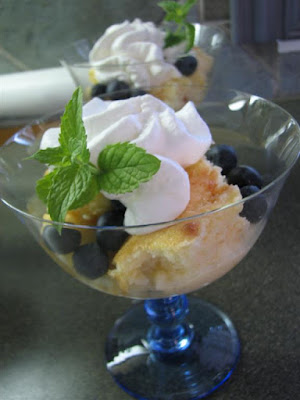 Lemon Pudding Cake with Blueberries and Whipped Cream