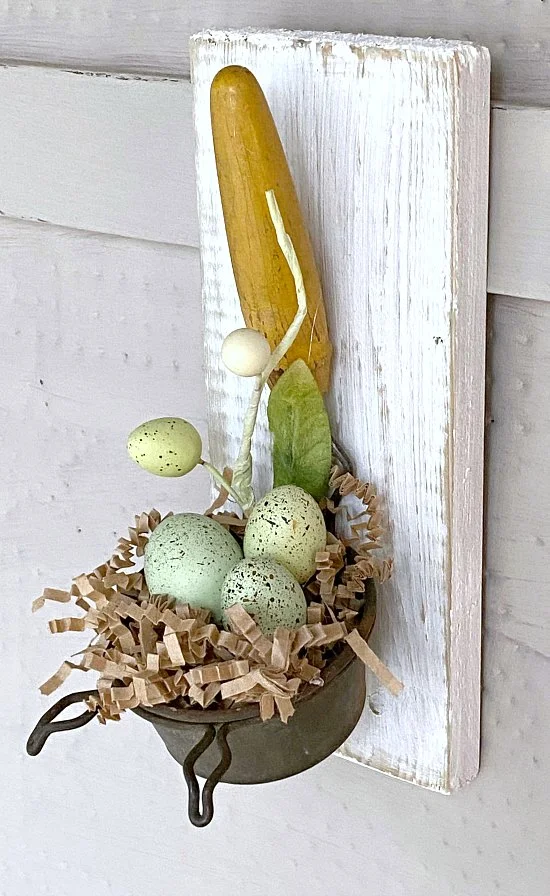 speckled eggs in a strainer