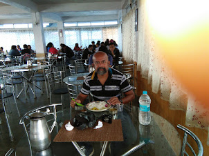 Seafarer /Blogger /Traveller Rudolph. A. Furtado having lunch at the restaurant in Nohkalikai compl