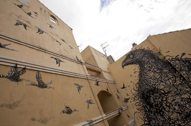Chinese Street Artist DALeast Paints A new mural in Malaga For "Maus Malaga" Urban Art Event. 2