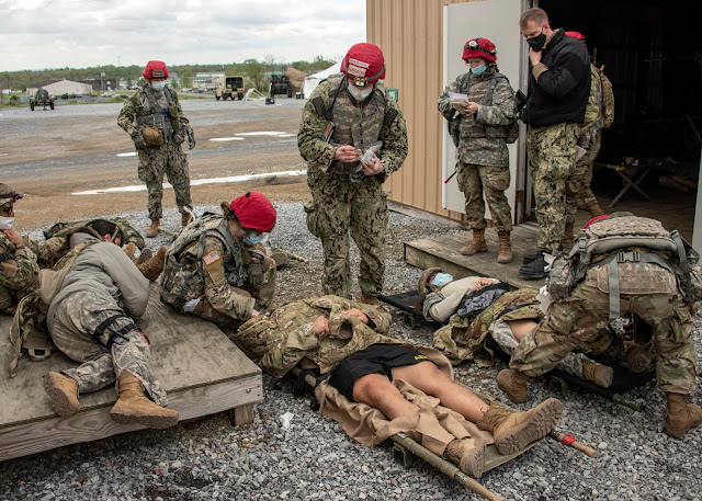 Students gathered together in face masks during the Bushmaster medical practicum