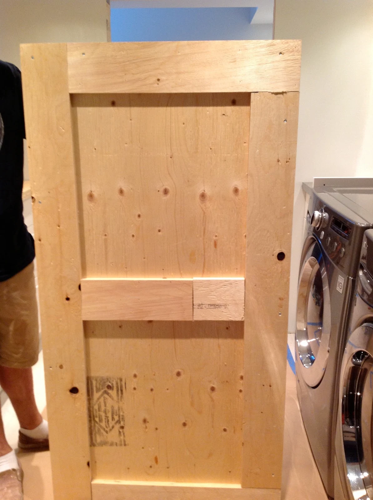 counter over front load washer and dryer, plywood countertop base, DIY floating countertop in the laundry room