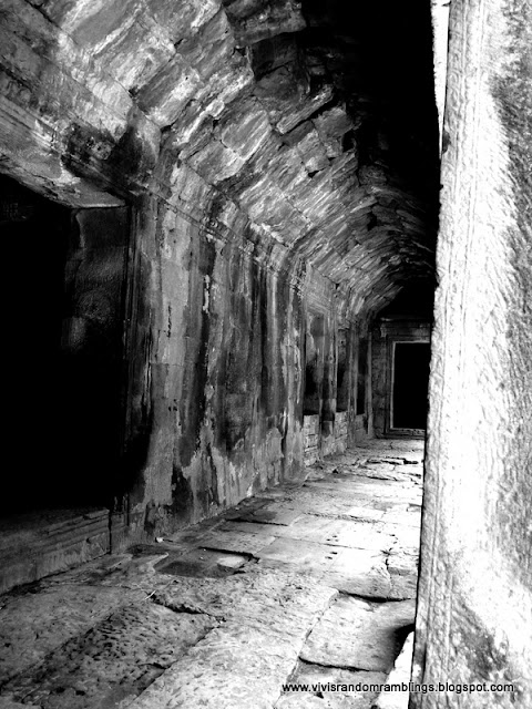 black and white photo of a creepy walkway at Bayon Temple, Cambodia. 