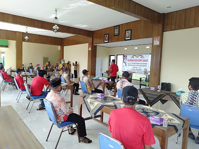 Sosialisasi Covid – 19 Kepada RT Se Desa Sidokerto