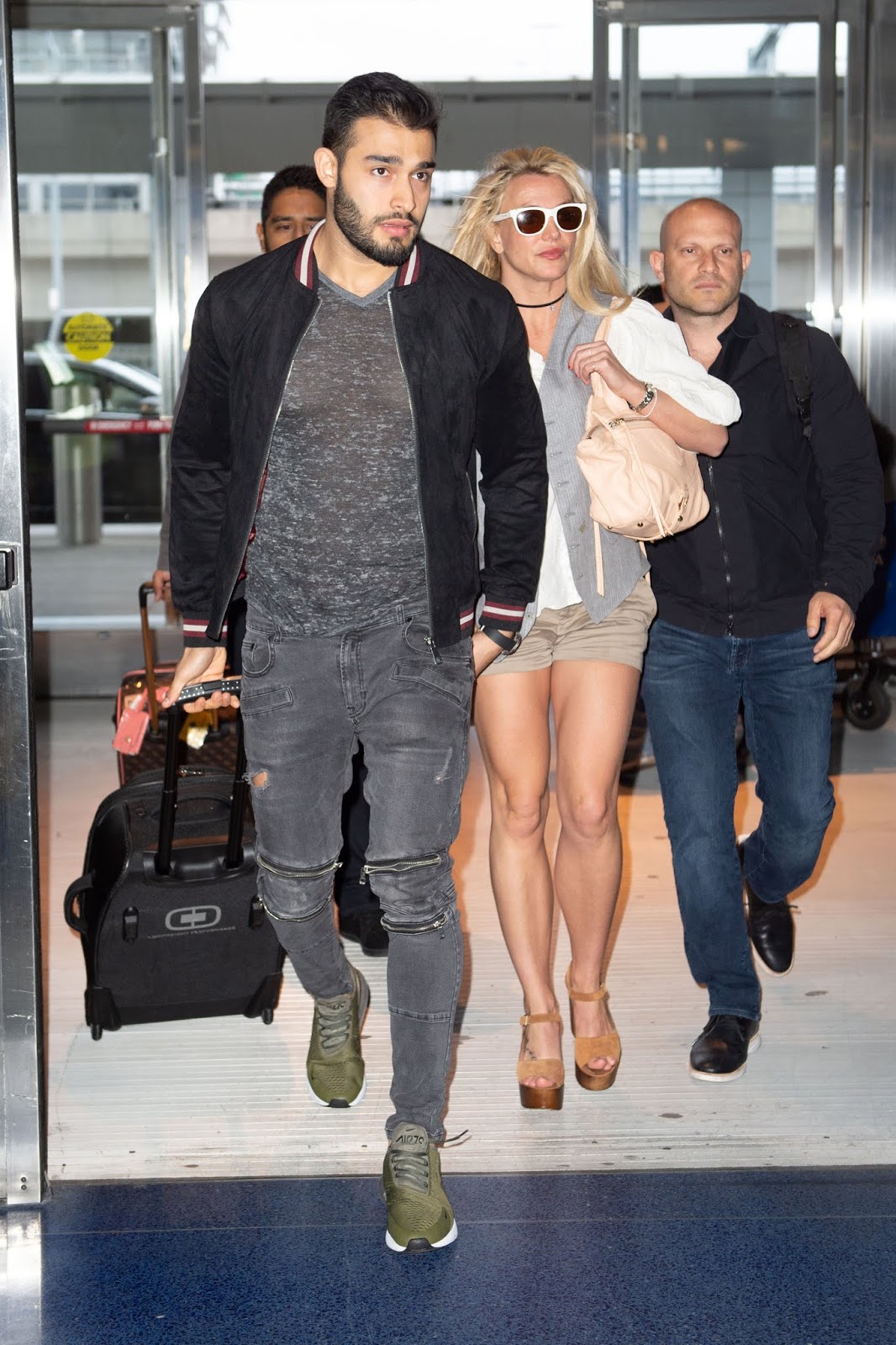 Britney Spears - "and Boyfriend Sam Asghari arrive hand in hand at JFK