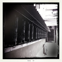 prayer wheels at boudhanath stupa