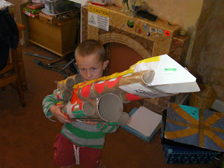 giant gun made of cardboard tubes and toilet rolls