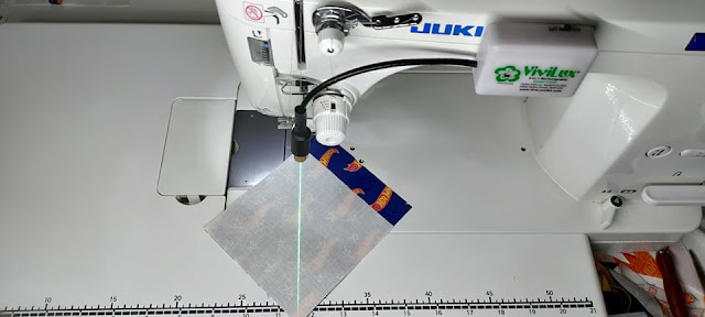Sewing machine laser