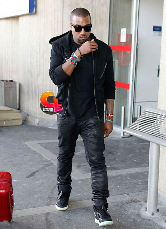 purple and stars: kanye west wearing air yeezy 2 at airport!