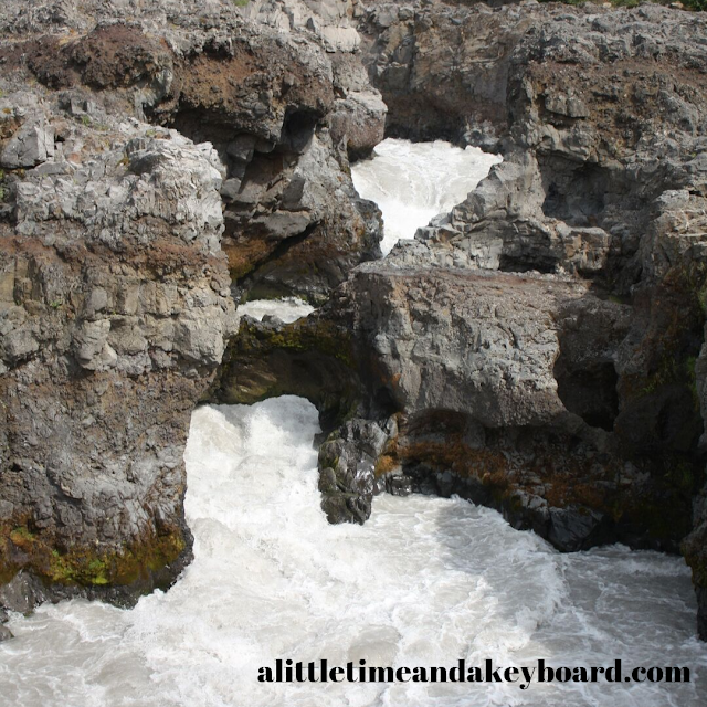 Barnafoss or Children's Falls thunders in West Iceland.
