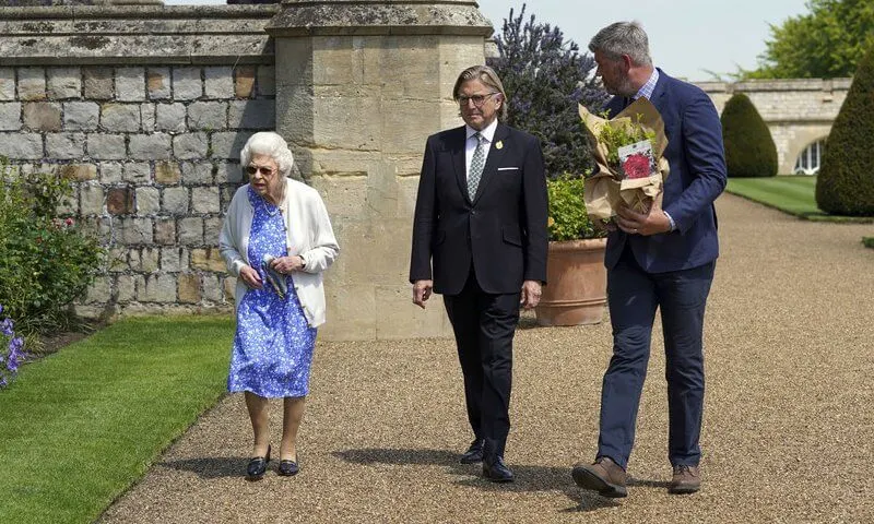 Queen Elizabeth has received a commemorative rose to mark what would have been the 100th birthday of the Duke of Edinburgh