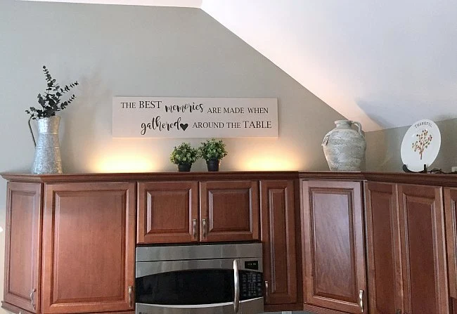 Best memories sign over kitchen cabinets