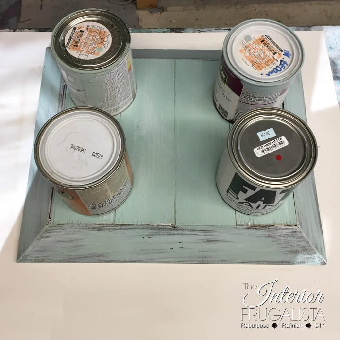 How to easily repurpose a picture frame into a handy serving tray for summer with wood slats painted pretty coastal colors and sisal rope handles.