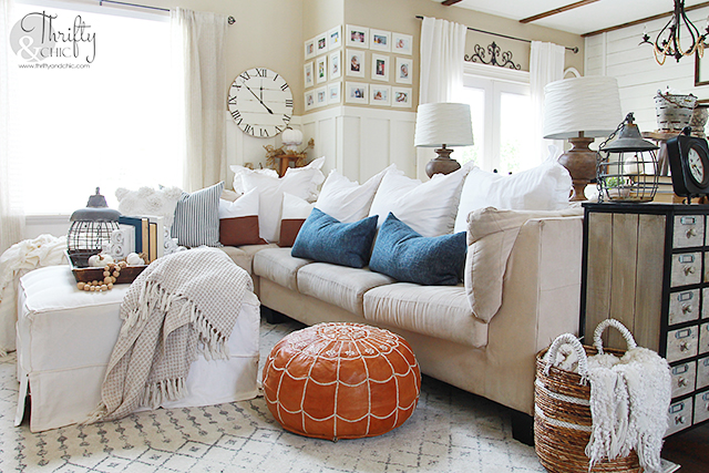 Fall living room decor and decorating ideas. Farmhouse fall decor. How to decorate for fall. Neutral fall decor. Easy fall decorating tips and tricks. Fall mantel decorating ideas. Living room board and batten. Moroccan leather pouf and decorating.