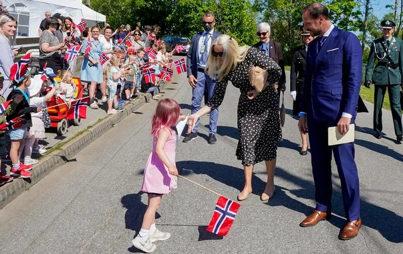 Crown Princess Mette-Marit wore a birds flying print dress from Pia Tjelta, and beige flats from Christian Louboutin