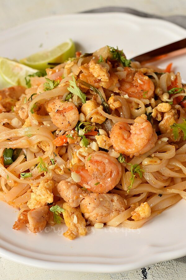 crushed peanuts,cilantro topped with real pad thai and served with lemon wedges