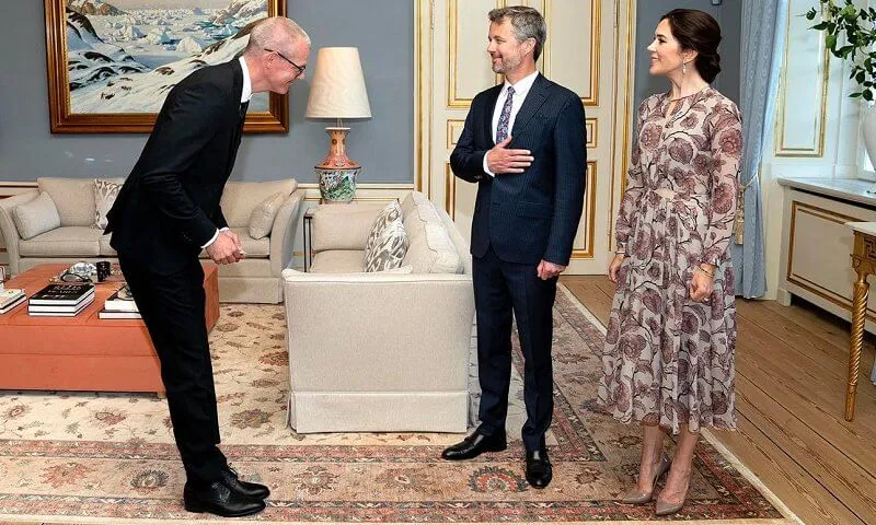 Crown Princess Mary wore a floral silk georgette dress from Burberry Prorsum, and love gold diamond bracelet from Cartier