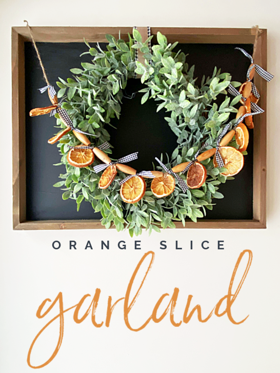 Orange slice garland on a wreath pin with overlay