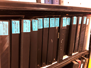 shelf of notebooks