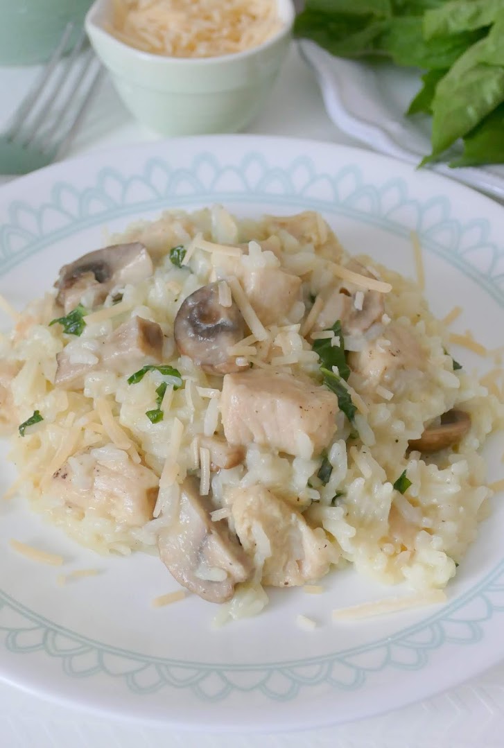 This easy and delicious weeknight dinner idea is ready in less than 30 minutes! It combines chicken breast, jasmine rice, shredded parmesan cheese, white mushrooms and basil for a tasty one pan meal!