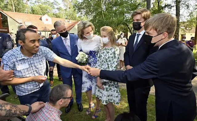 Princess Eleonore wore a roman-lace inset floral print dress from Maje. Blue floral print dress from Carolina Herrera