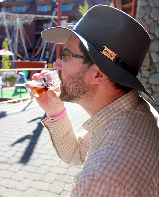 Cowboys love beer, even sipped from tiny glasses