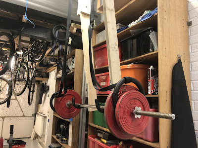 Low cost, space saving, DIY home squat rack