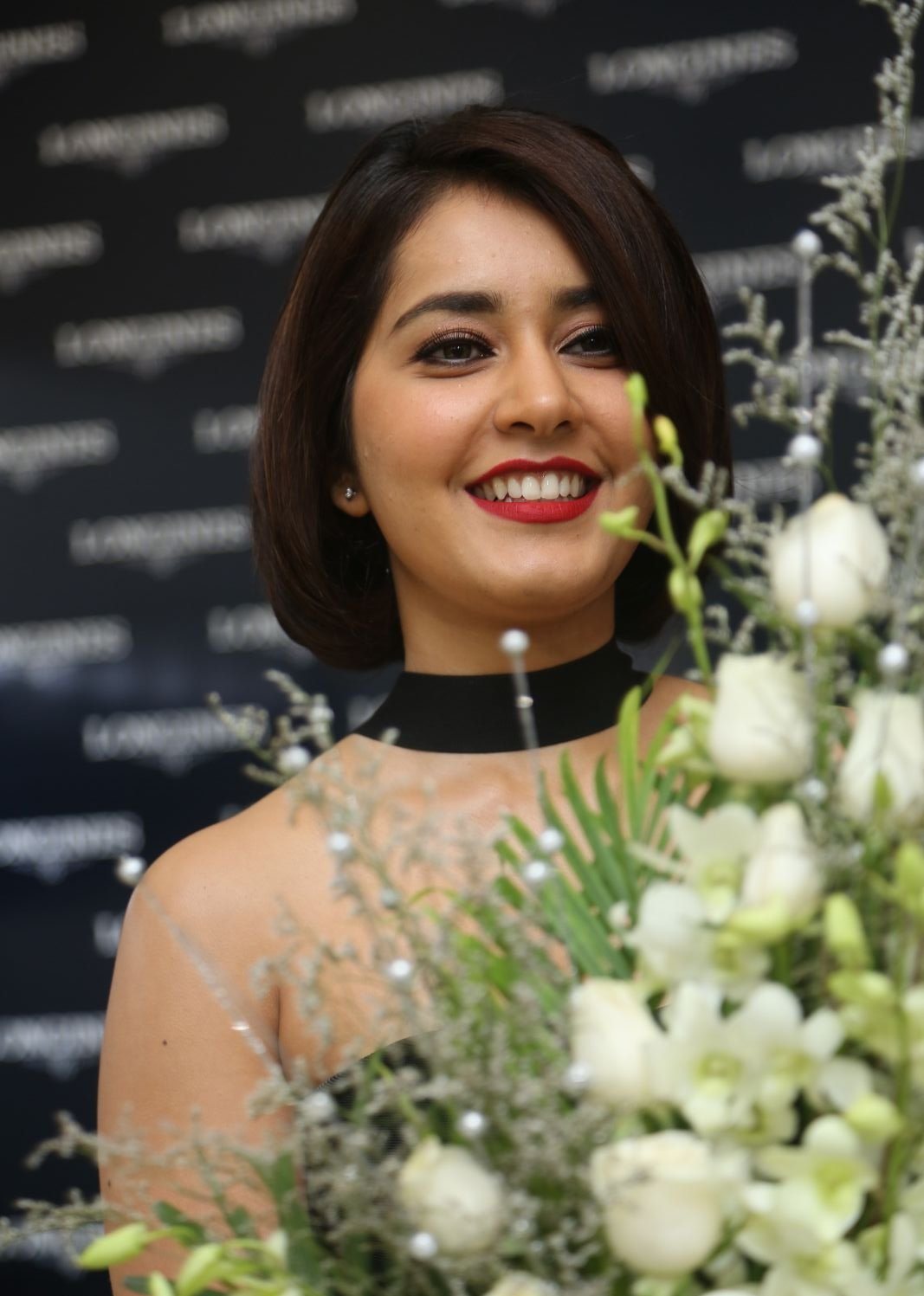 Raashi Khanna Looks Irresistibly Sexy In a Black Figure Hugging At The Launch Of Longines Watchesâ€™s Latest Collection In Jubilee Hills, Hyderabad