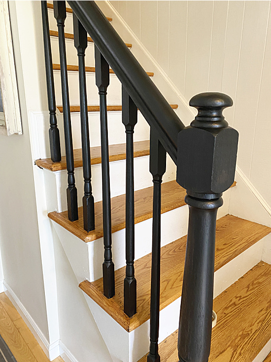 black painted spindles and newel post