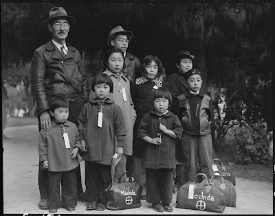 Photograph of Members of the Mochida Family Awaiting Evacuation (Wikipedia)