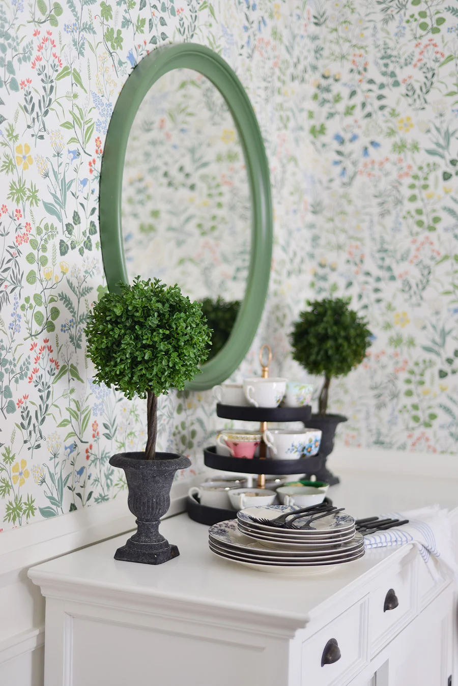 spring decorations for the home, Scandianvian Borastapeter flora white wallpaper, green round mirror, buffet display, faux topiary