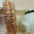 Golden kundan bangles