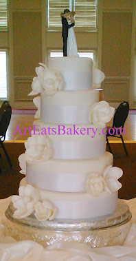 Five tier white magnolia wedding cake