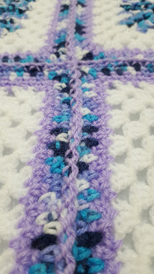 A detail of handmade blanket for a babyboy