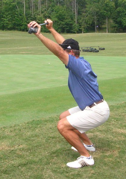 Overhead deep squat before practice putting