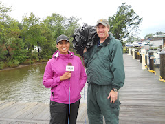 Our news team.  Eric, the cameraman, asked me to take their photo, (with his cell phone)  also.