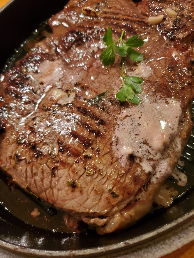 this is grilled steak with chianti butter on top